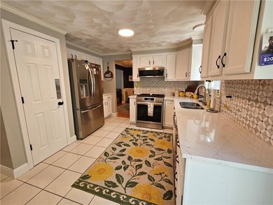 Located in the desirable Apponaug Cove neighborhood with water - photo 4
