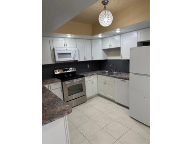 Lake Wellington Townhome/Townhouse For Sale in Wellington Florida