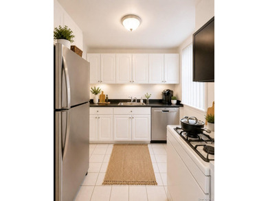 Welcome home to this sun-filled second-floor CORNER unit in a - photo 5