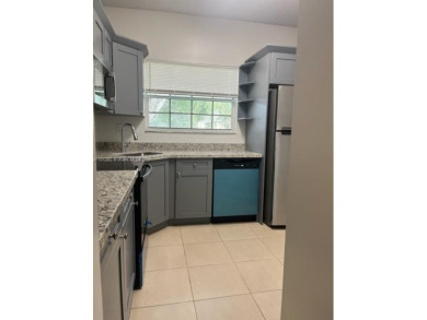 Lake Condo For Sale in Pembroke Pines, Florida