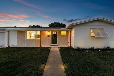 Welcome to this charming three-bedroom, two-bathroom - photo 44