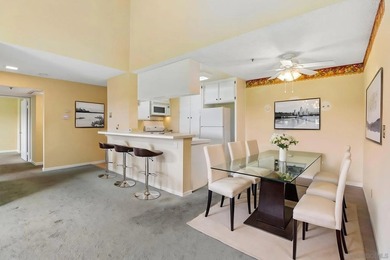 Stunning golf course views and high vaulted ceilings make this - photo 4