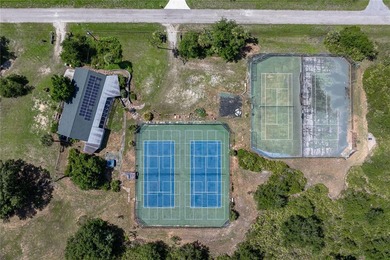 RARE ACREAGE OPPORTUNITY IN PUNTA GORDA W/PRIVATE TENNIS - photo 6