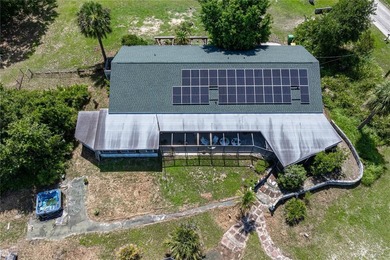 RARE ACREAGE OPPORTUNITY IN PUNTA GORDA W/PRIVATE TENNIS - photo 8