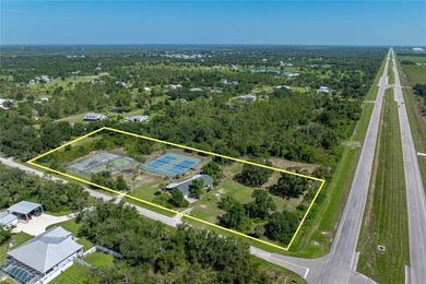 RARE ACREAGE OPPORTUNITY IN PUNTA GORDA W/PRIVATE TENNIS - photo 10
