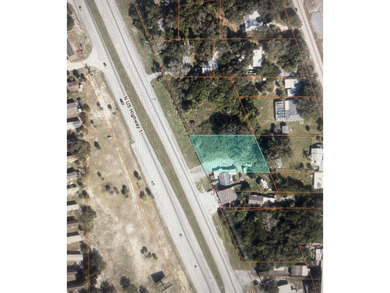 Build ready .46 acre commercial zoned parcel. Close to highways - photo 1