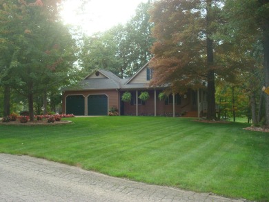 Lake Diane Water front Chalet has beautiful new wood flooring on  - Lake Home SOLD! in Camden, Michigan