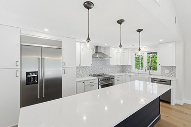 Impeccable renovations are now complete on this stunning - photo 11