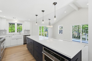 Impeccable renovations are now complete on this stunning - photo 14