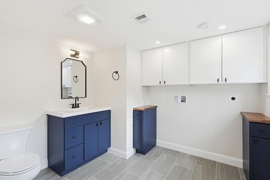 Impeccable renovations are now complete on this stunning - photo 28