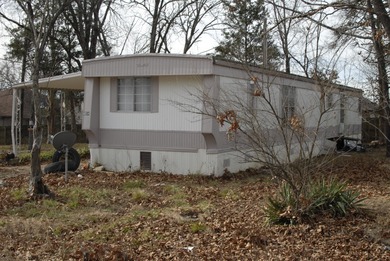 Lake Taneycomo Home Sale Pending in Merriam Woods Missouri