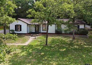 Charming 3-bedroom, 2-bath home located in the gated Hide A Way - photo 1