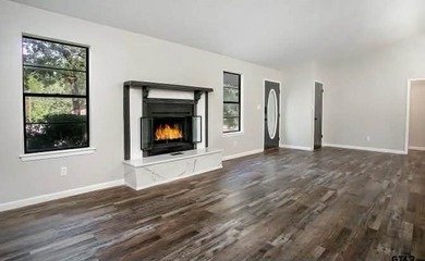 Charming 3-bedroom, 2-bath home located in the gated Hide A Way - photo 2