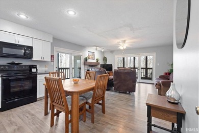 Nestled among the trees at Eagle Pointe Resort, this 2-bedroom - photo 1