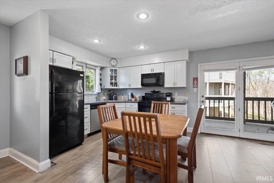 Nestled among the trees at Eagle Pointe Resort, this 2-bedroom - photo 2