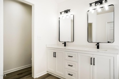 This fully refreshed 4-bedroom, 2.5-bath home with a 2-car - photo 14