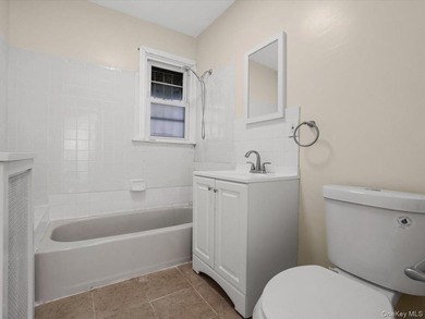 Beautiful renovated semi-attached colonial on a quiet tree lined - photo 10
