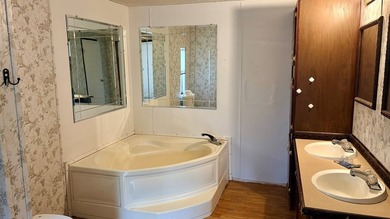 Spacious 4-bedroom, 2-bathroom mobile home nestled on a - photo 3