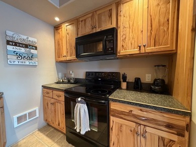 Impeccably maintained home with 125 feet of frontage on Blue Dog - photo 11