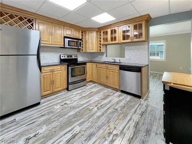 Where do we even begin with this beautifully updated 2-bedroom - photo 12