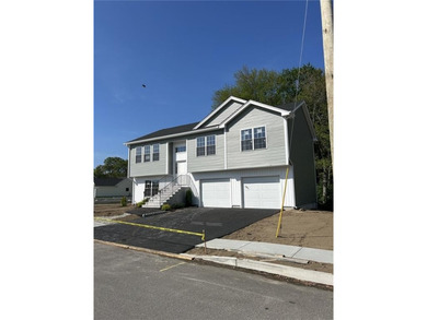 This brand new new, unique raised-ranch style home, located at - photo 1