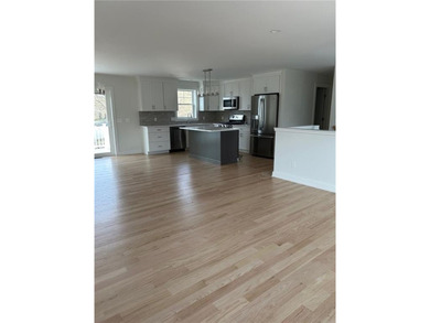 This brand new new, unique raised-ranch style home, located at - photo 2