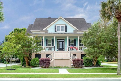 Welcome to this beautifully elevated Lowcountry-style home--the - photo 1
