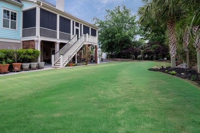 Welcome to this beautifully elevated Lowcountry-style home--the - photo 4