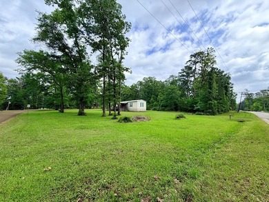 Set on a full acre in the desirable Laguna Shores subdivision on - photo 2