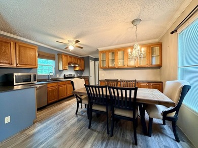 Set on a full acre in the desirable Laguna Shores subdivision on - photo 3