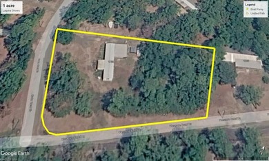 Set on a full acre in the desirable Laguna Shores subdivision on - photo 5