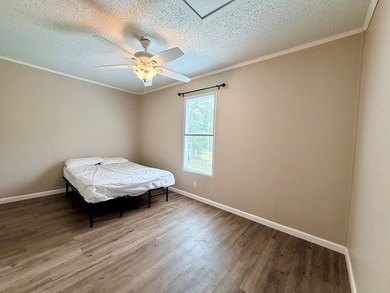 Set on a full acre in the desirable Laguna Shores subdivision on - photo 7