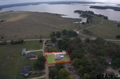 This property has everything you need!! Nice home with a great - Lake Home For Sale in Mount Pleasant, Texas