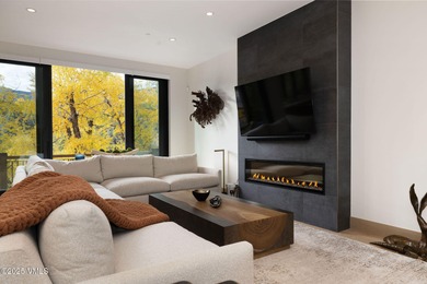Discover the opportunity to own a luxurious townhome in Avon's - photo 3