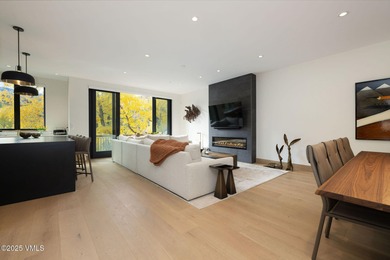 Discover the opportunity to own a luxurious townhome in Avon's - photo 4