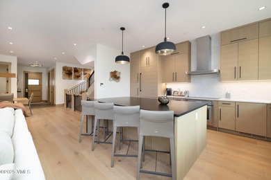 Discover the opportunity to own a luxurious townhome in Avon's - photo 6