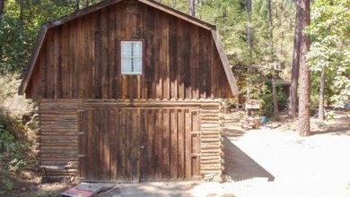 Welcome to your dream home-a stunning log cabin blending classic - photo 4