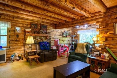 Welcome to your dream home-a stunning log cabin blending classic - photo 9