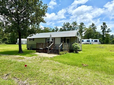 Lake fun meets opportunity with this versatile property-perfect - photo 1