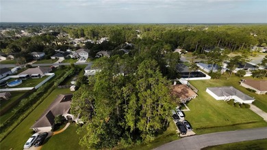 Discover a fantastic opportunity with this .23-acre wooded lot - photo 8