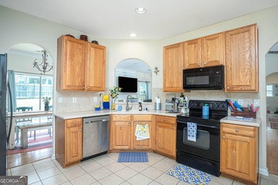 Welcome home to this beautifully maintained 4-bedroom, 2-bath - photo 14