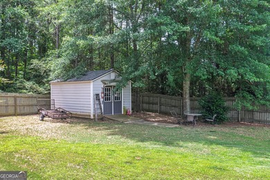 Welcome home to this beautifully maintained 4-bedroom, 2-bath - photo 33