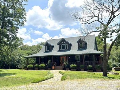 Move-in-ready home on 9 acres is only 30 minutes from Overland - photo 1