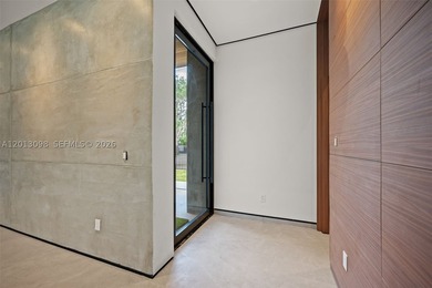 Set in one of Miami's most sought-after neighborhoods, this - photo 3