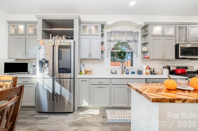 Beautifully remodeled home on over an acre, offering the perfect