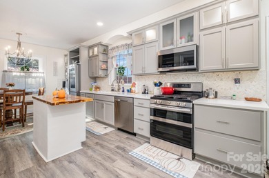 Beautifully remodeled home on over an acre, offering the perfect