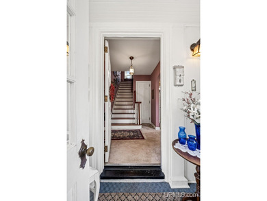 Step into the charm of the 1940s with this classic two-story - photo 3