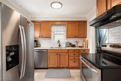 Welcome to this beautifully updated and meticulously maintained - photo 9