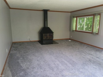 Located just 10 minutes from downtown Caro. This 3-bedroom, 1 - photo 2