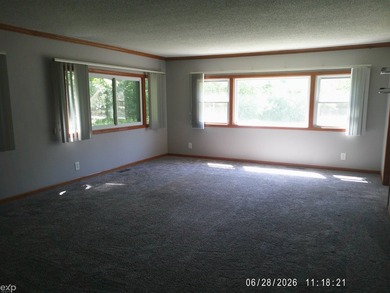 Located just 10 minutes from downtown Caro. This 3-bedroom, 1 - photo 3